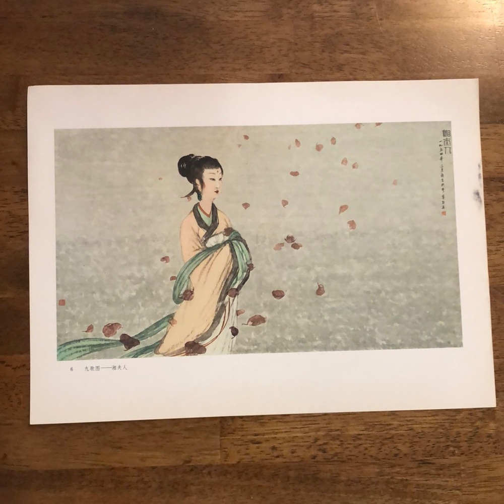 Asian Print Lady Outdoors In Autumn Leaves In The Breeze